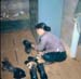 B27. MamaSan Taking Care of Our Dirty BootsE